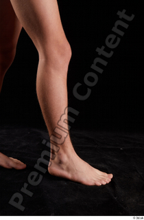 Matthew  1 calf flexing nude side view 0002.jpg